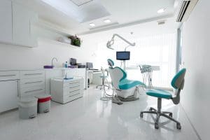 Dentist providing affordable dental bonding near me at One Stop Dental in Colorado Springs, CO. Call 719-447-1199 to schedule an appointment.