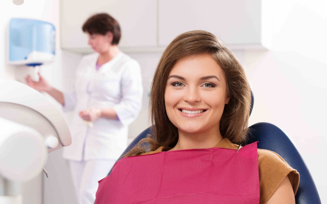 Patient receiving treatment from the best dentist for dental bonding at One Stop Dental in Colorado Springs, CO. Call 719-447-1199 to book an appointment.